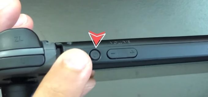 Hold nintendo switch Power button